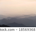 Misty mountain ranges 18569368