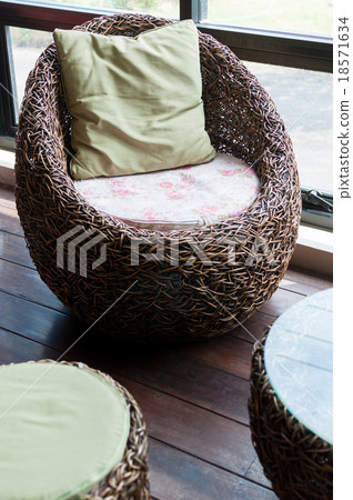 Vine metal weave chair in a cafe Vine metal weave chair in a cafe 18571634
