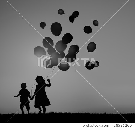 Two Children Outdoors Holding Balloons Concept Two Children Outdoors Holding Balloons Concept 18585260