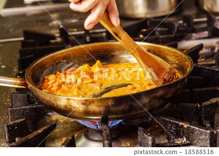 Steaming food in the frying pan 18588516