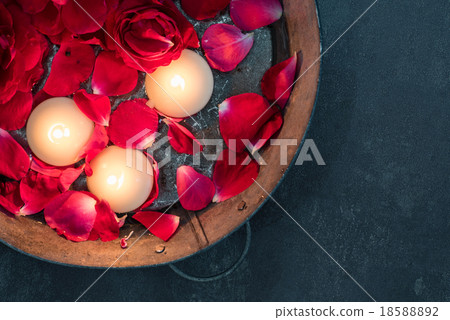 red roses and candles 18588892