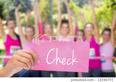 Check against smiling women running for breast cancer awareness Check against smiling women running for breast cancer awareness 18590755
