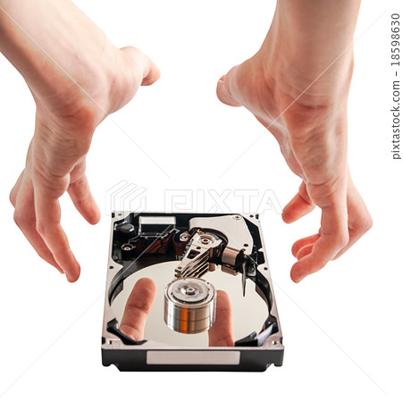 Hard drive details and hands 18598630