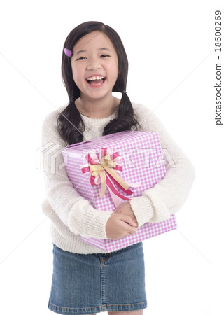 Cute asian girl giving a present 18600269