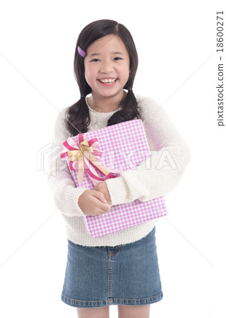 Cute asian girl giving a present Cute asian girl giving a present 18600271