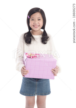 Cute asian girl giving a present 18600273