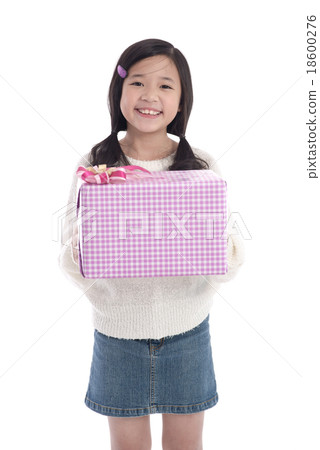 Cute asian girl giving a present 18600276