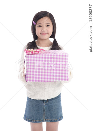 Cute asian girl giving a present Cute asian girl giving a present 18600277