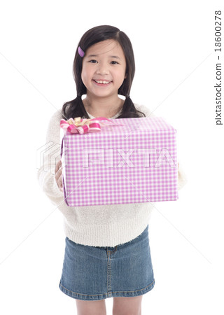 Cute asian girl giving a present Cute asian girl giving a present 18600278