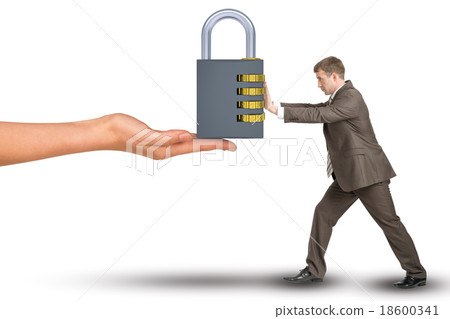 Hand giving keylock to businessman 18600341