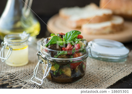 Baked eggplant with tomatoes, garlic and paprika Baked eggplant with tomatoes, garlic and paprika 18605301