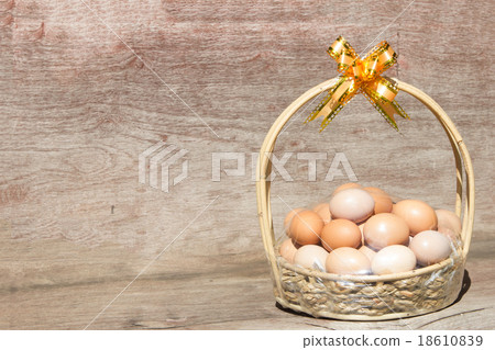 Gift eggs on wooden background. Gift eggs on wooden background. 18610839
