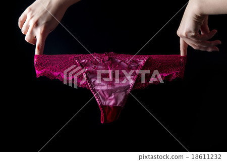 Panties stretching on black background 18611232
