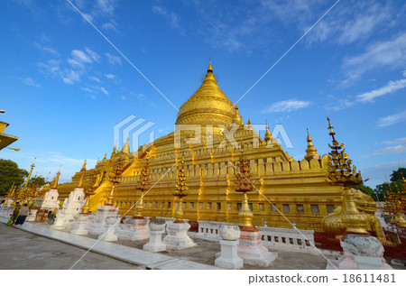 The Shwezigon Pagoda in Nyaung-U, Bagan, Myanmar. The Shwezigon Pagoda in Nyaung-U, Bagan, Myanmar. 18611481
