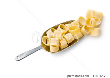 uncooked pasta calamarata in metal scoop uncooked pasta calamarata in metal scoop 18616572