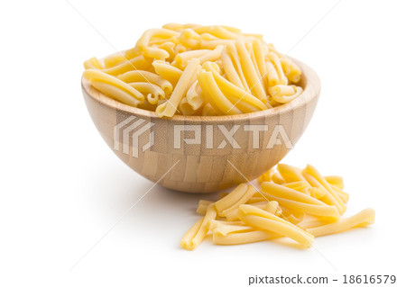 uncooked pasta caserecce in bowl 18616579