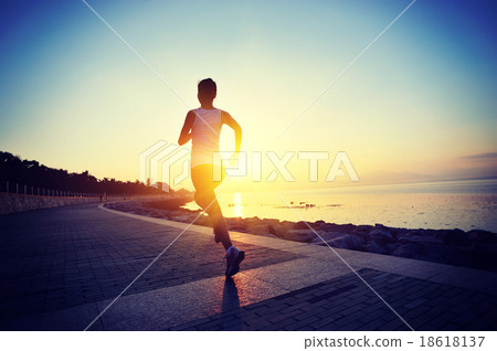 healthy lifestyle fitness woman running at seaside healthy lifestyle fitness woman running at seaside 18618137