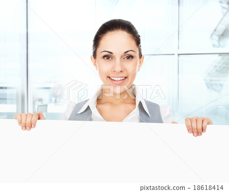 businesswoman holding a blank white card board businesswoman holding a blank white card board 18618414