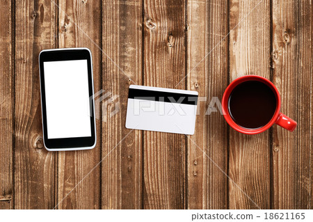 Coffee cup, cell phone and plastic card mock-up Coffee cup, cell phone and plastic card mock-up 18621165
