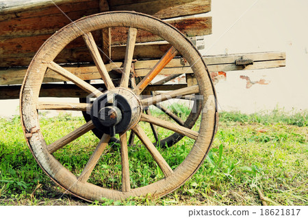 Wheel of old wooden cart taken closeup. 18621817