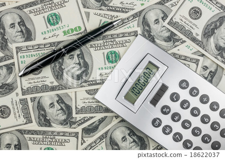Pen,calculator and dollars closeup. Pen,calculator and dollars closeup. 18622037
