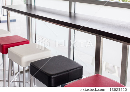 Color   chairs near bar, indoor 18625320