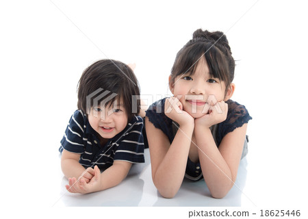 Asian children lying on the floor Asian children lying on the floor 18625446
