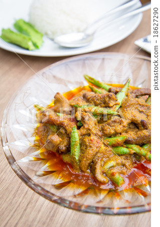 Serving spicy stir pork with green cowpea 18627290
