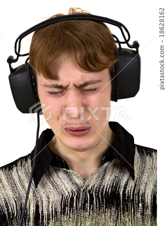 The young man in ear-phones The young man in ear-phones 18628162