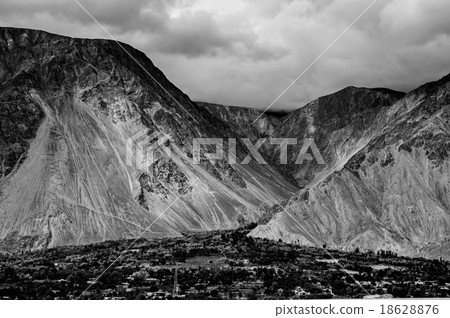 mountain peaks through the clouds mountain peaks through the clouds 18628876