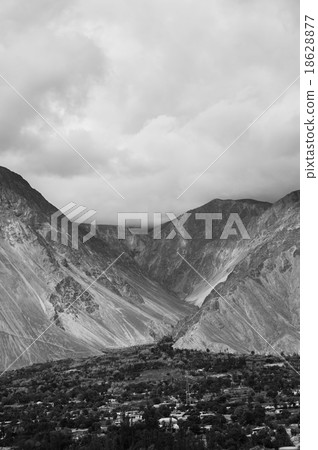 mountain peaks through the clouds mountain peaks through the clouds 18628877