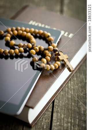 wooden rosary beads with computer tablet 18633121