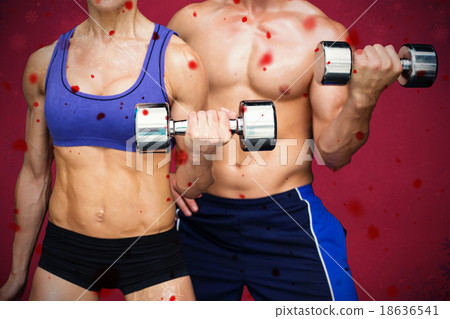 Composite image of bodybuilding couple Composite image of bodybuilding couple 18636541