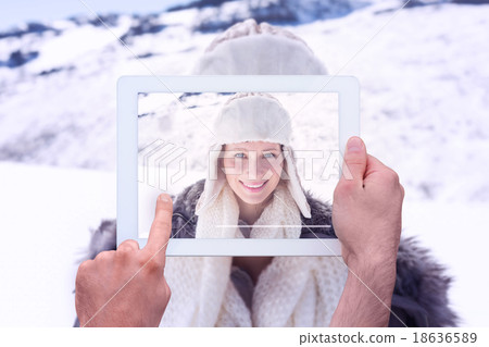 Composite image of hand holding tablet pc Composite image of hand holding tablet pc 18636589