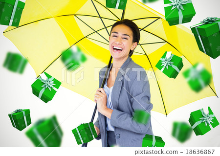 Composite image of portrait of happy businesswoman holding umbre Composite image of portrait of happy businesswoman holding umbre 18636867
