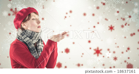 Composite image of woman blowing kiss from hands 18637161