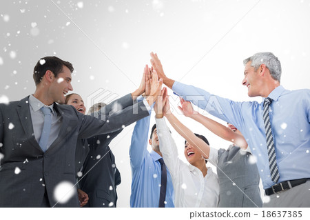 Composite image of business people doing hands checks Composite image of business people doing hands checks 18637385