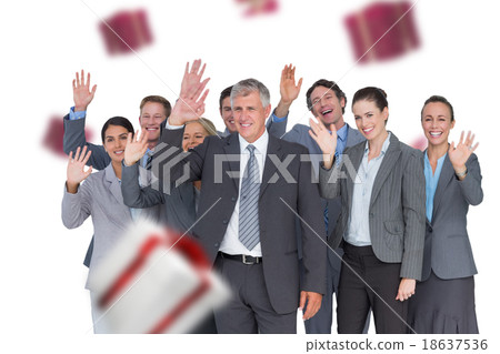 Composite image of smiling business team waving at camera Composite image of smiling business team waving at camera 18637536