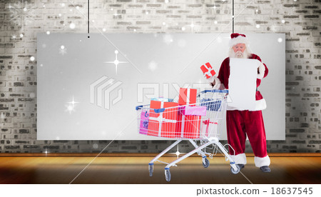 Composite image of santa delivering gifts from cart Composite image of santa delivering gifts from cart 18637545