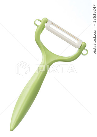 Greem fruit peeler isolated on white background 18639247