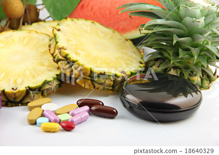 Fruits and medicines placed near the cosmetics. 18640329