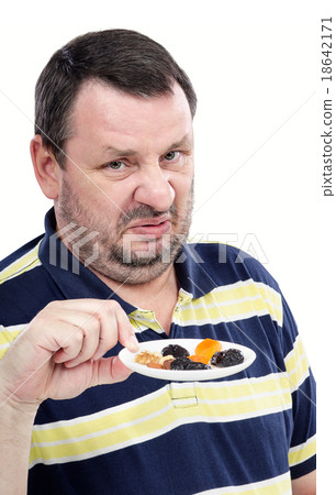 Holding plate of dried fruits with aversion 18642171 - 18642171