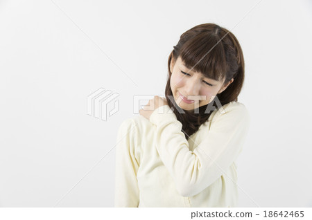 A woman with stiff shoulders A woman with stiff shoulders 18642465