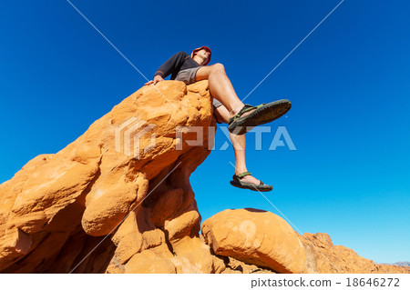 Man on the cliff 18646272