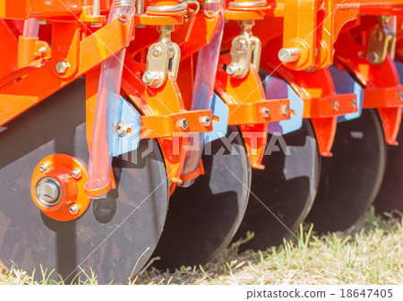 图库照片: close up new tractor plow
