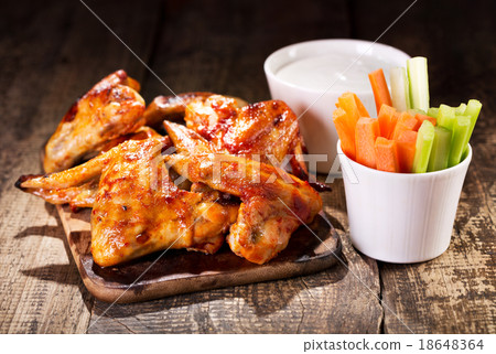 chicken wings with fresh vegetables and sauce chicken wings with fresh vegetables and sauce 18648364