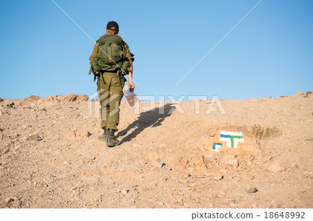 Soldiers patrol in desert 18648992