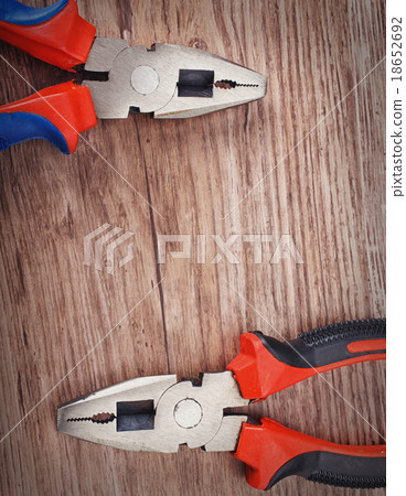 pliers on wooden 18652692