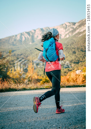 young girl running mountain marathon young girl running mountain marathon 18653455