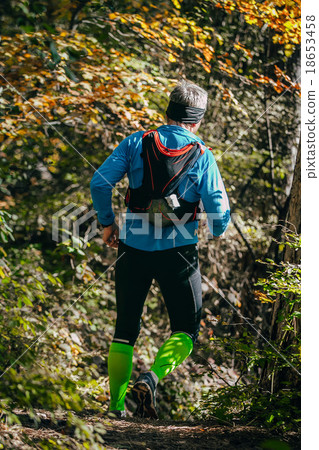 young athlete man running mountain marathon young athlete man running mountain marathon 18653458
